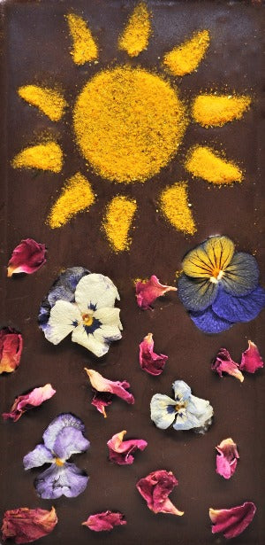 Freeze-Dried Natural Edible Pansy Flowers, Dried Natural Edible Rose Petals, and Natural Turmeric with a hint of Natural Fresh Cardamom Powder Chocolate